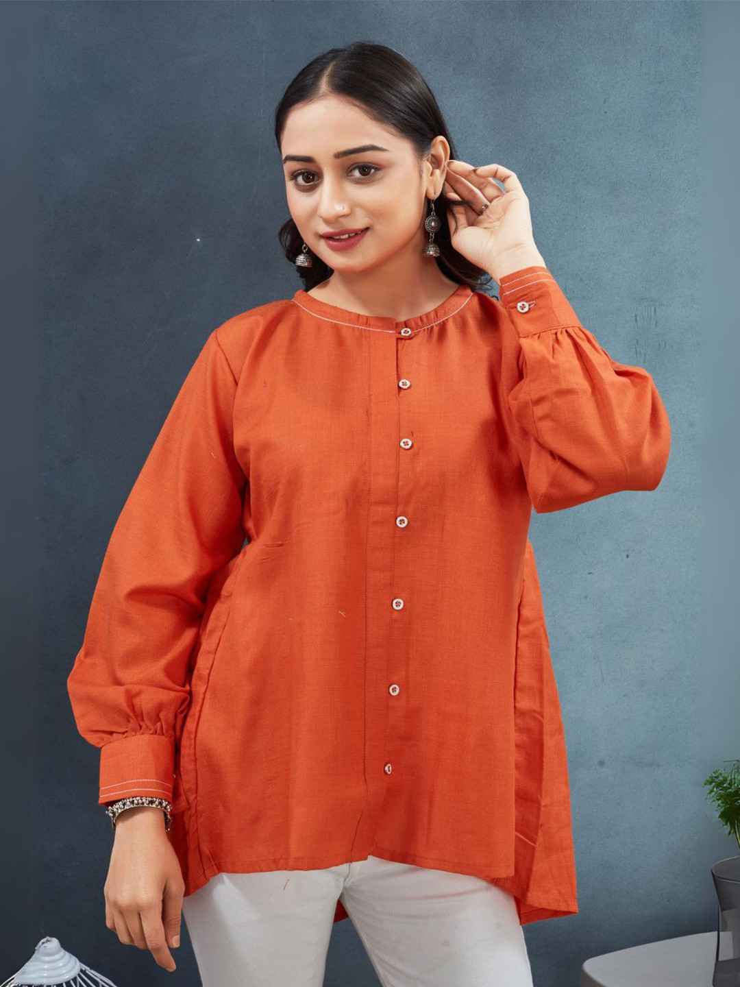 Flossy Women Solid Pattern Tunic