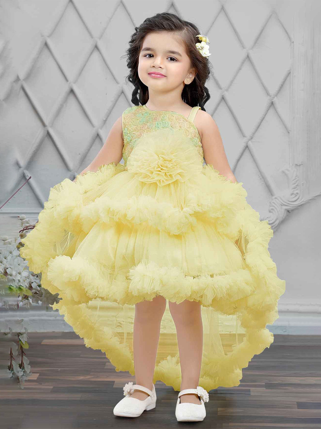Lagorii Girls Lemon Yellow Tailback Frock With Floral Embellishments