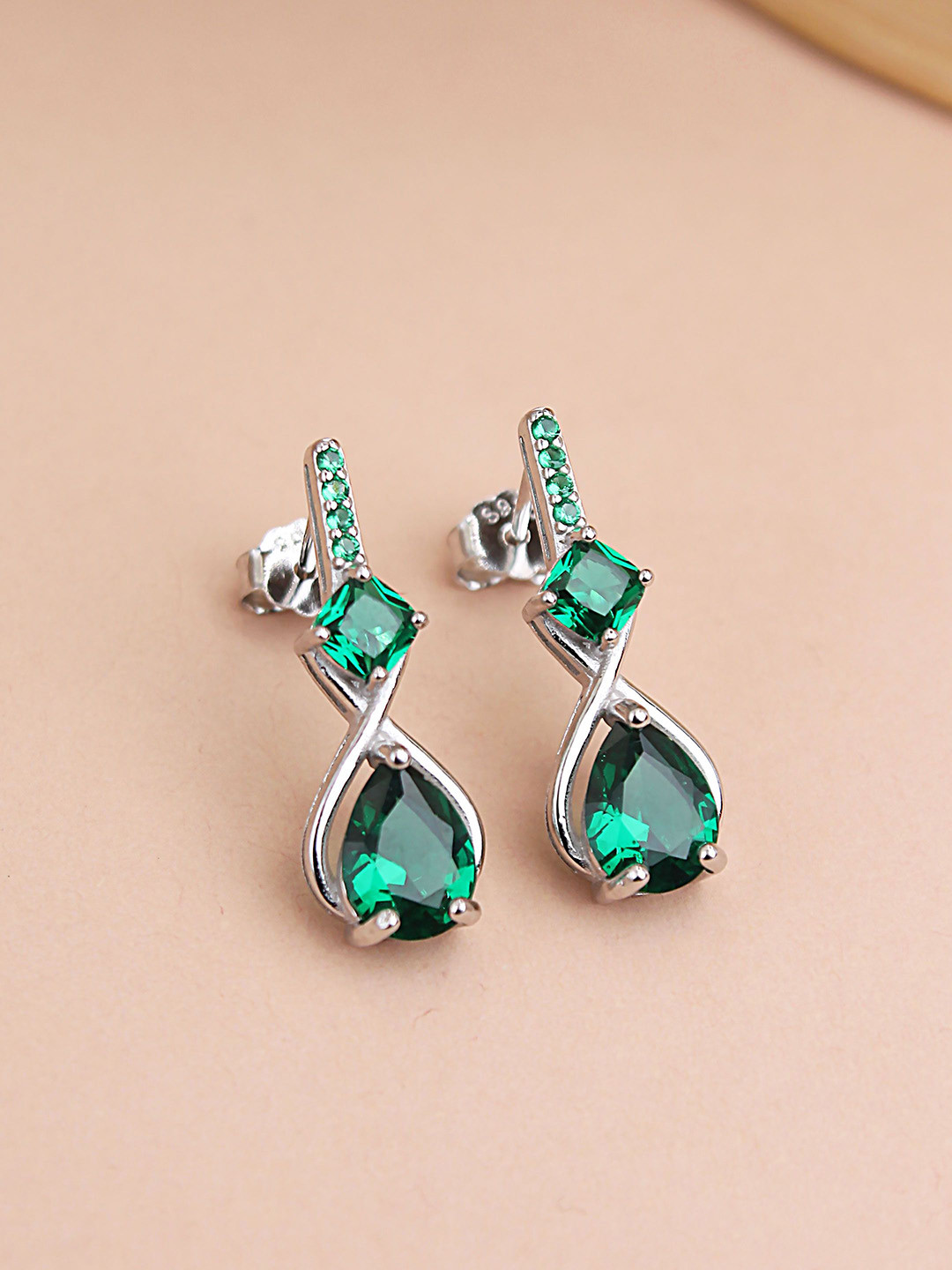 DEVASHREE 925 Silver Rhodium-Plated CZ & Emerald Studded Twisted Pear Drop Earrings