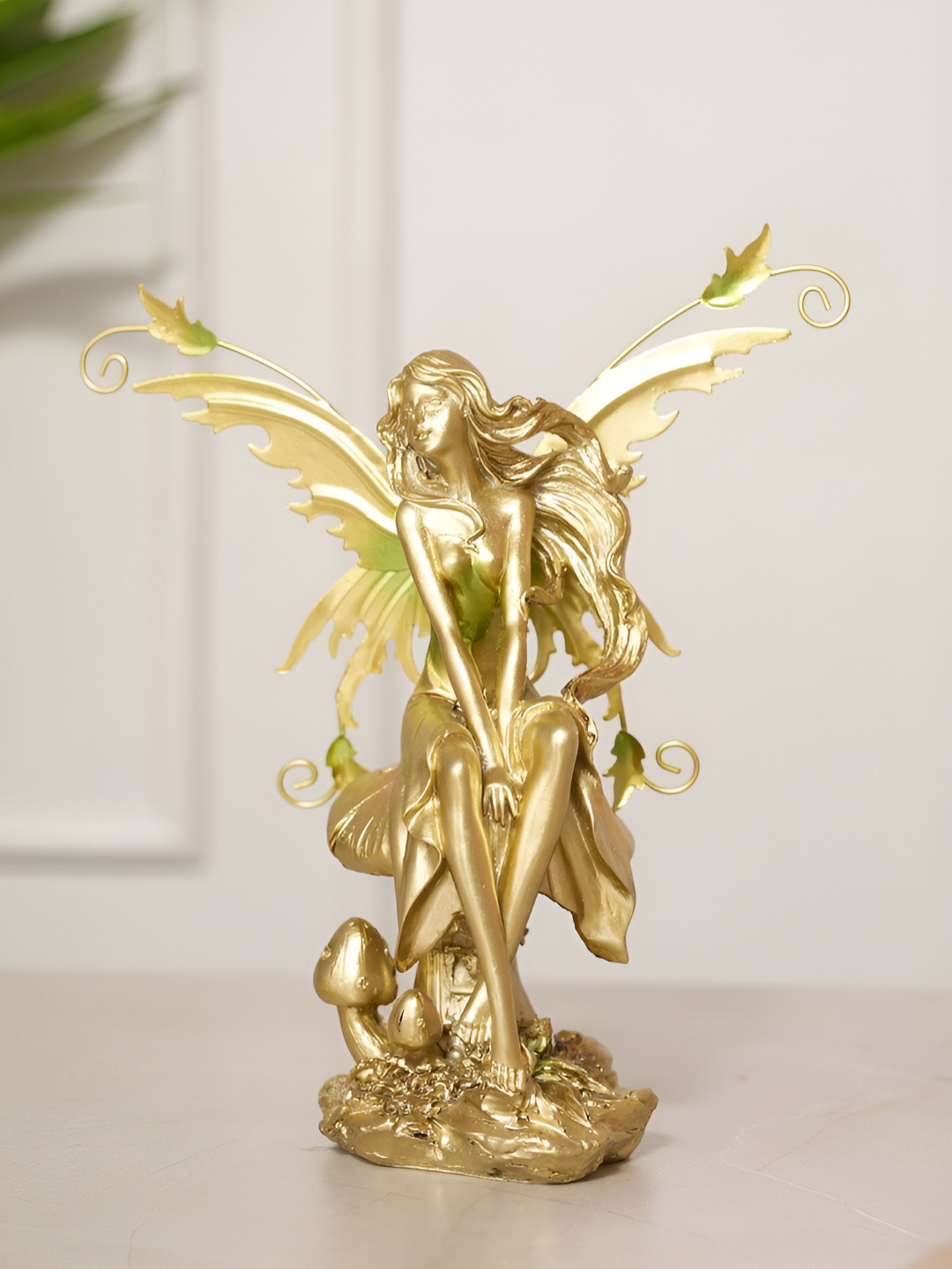 HOME 360 Fantasy Fairy Graceful Pose Gold Polyresin Glossy Home Office Medium Showpiece - 3.9 Inches