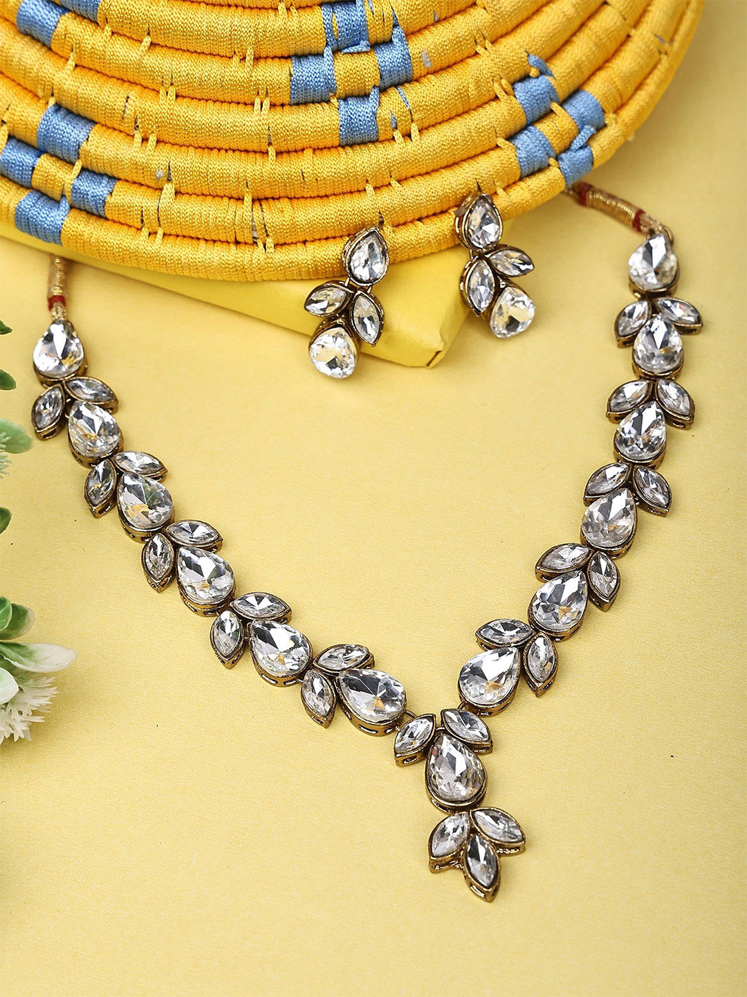Dhivara Kundan Studded Necklace And Earrings