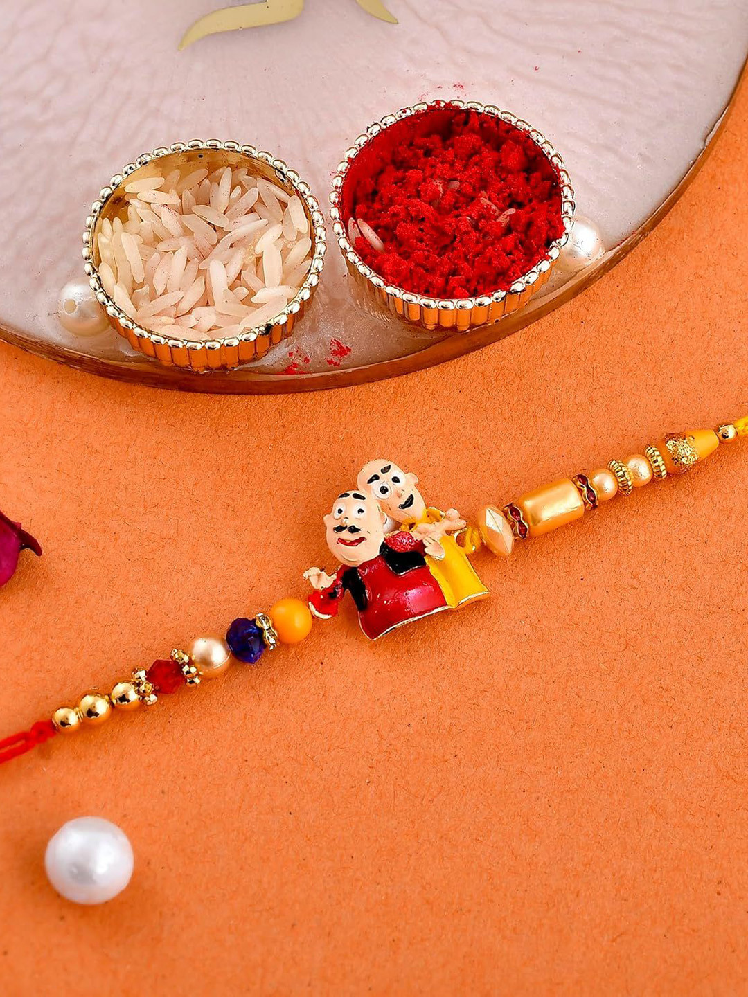 Ascension Cartoon Beaded Rakhi With Fridge Magnet & Roli Tilak