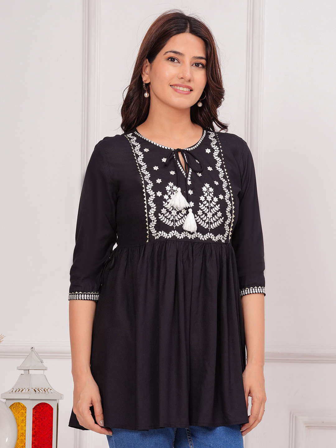 Gvastra Women Solid Embroidered tussles Keyhole Neck Top With Tie Ups