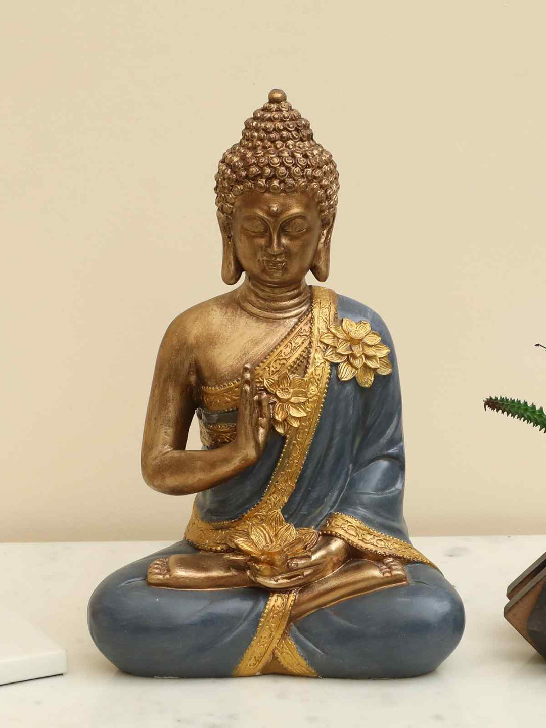 vedas S-Revata Flower Blessing Buddha Gold Polyresin Glossy Living Room Medium Showpiece - 13 Inches