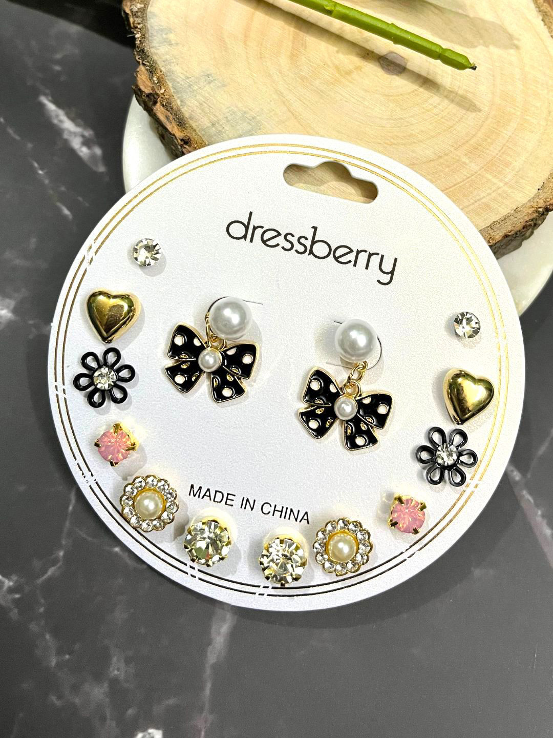 DressBerry Set of 7 Artificial Stones Studded Floral Shaped Studs