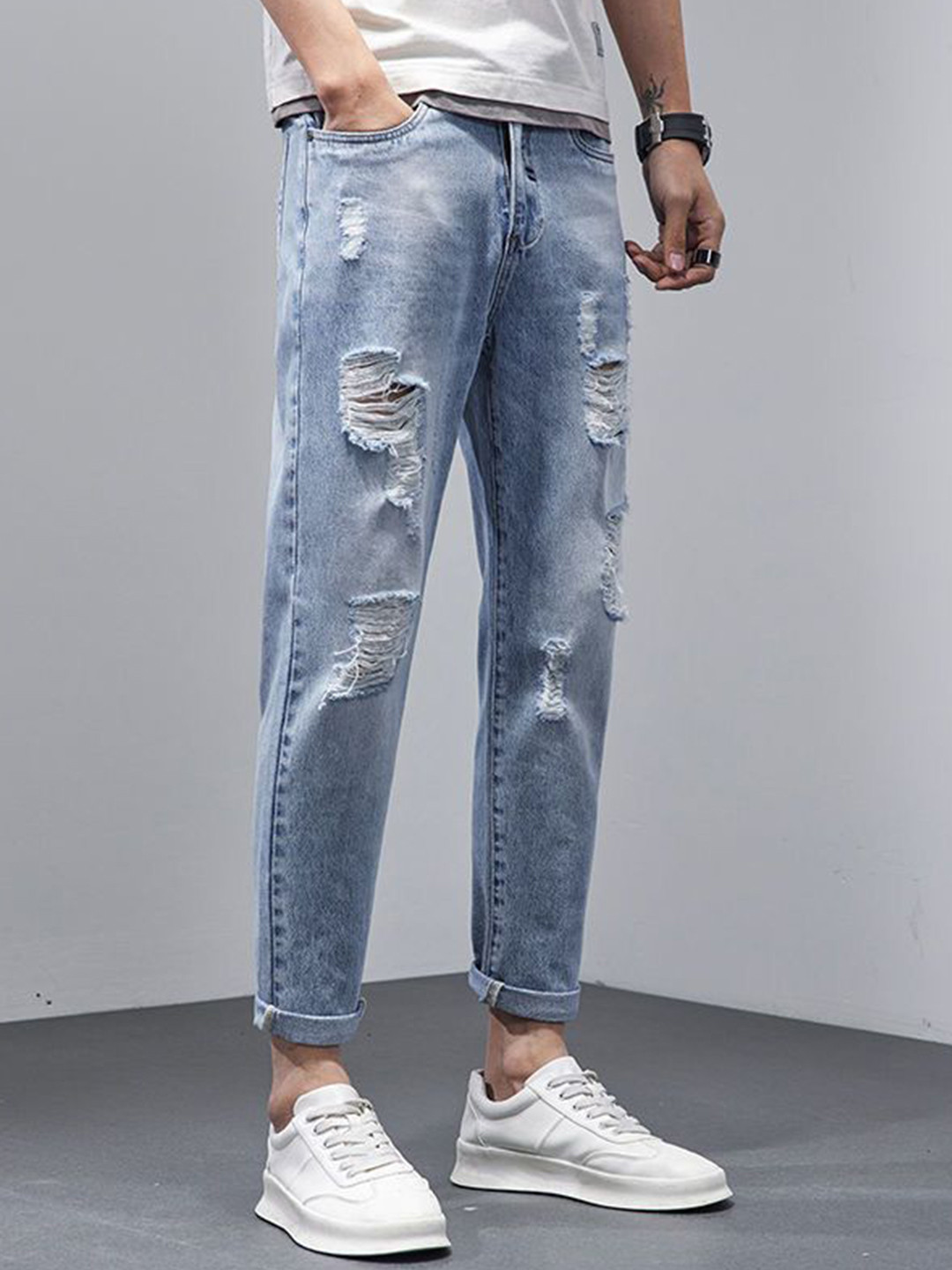 The Roadster Lifestyle Co. Men Ripped Slim Fit Mid-Rise Denim Jeans