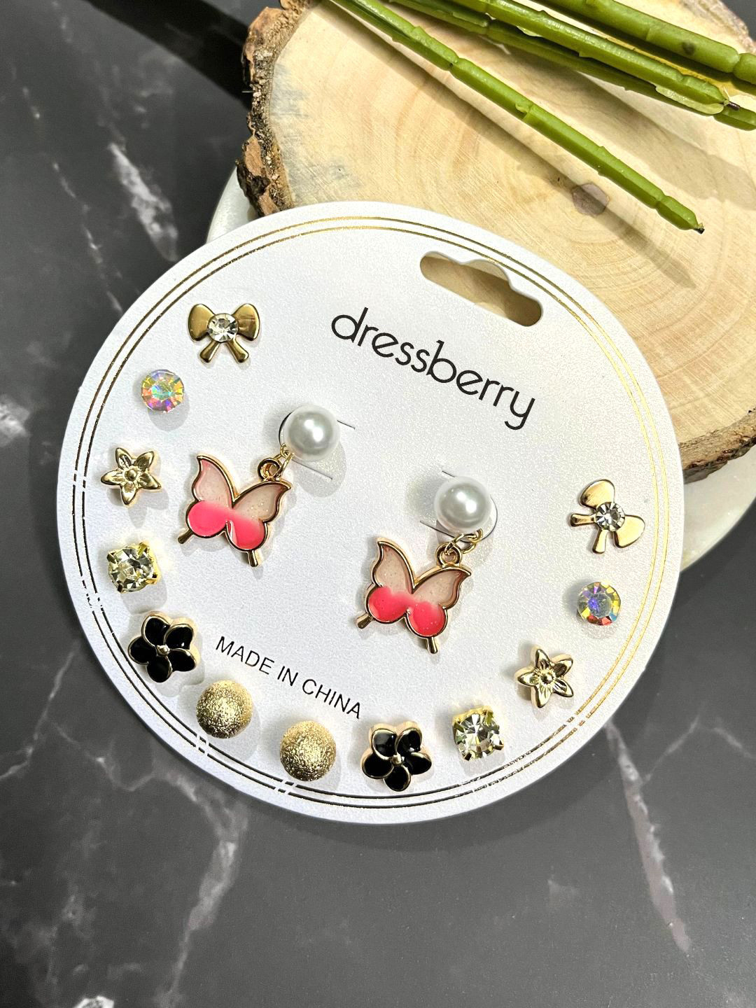 DressBerry Set of 7 Artificial Stones Studded Floral Shaped Studs