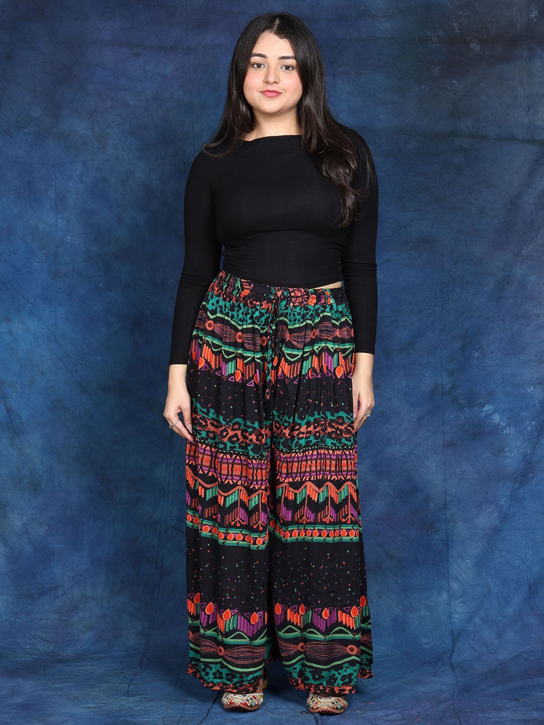 Exotic India Women Black Wide Casual Trousers with Printed Leopard-Spots