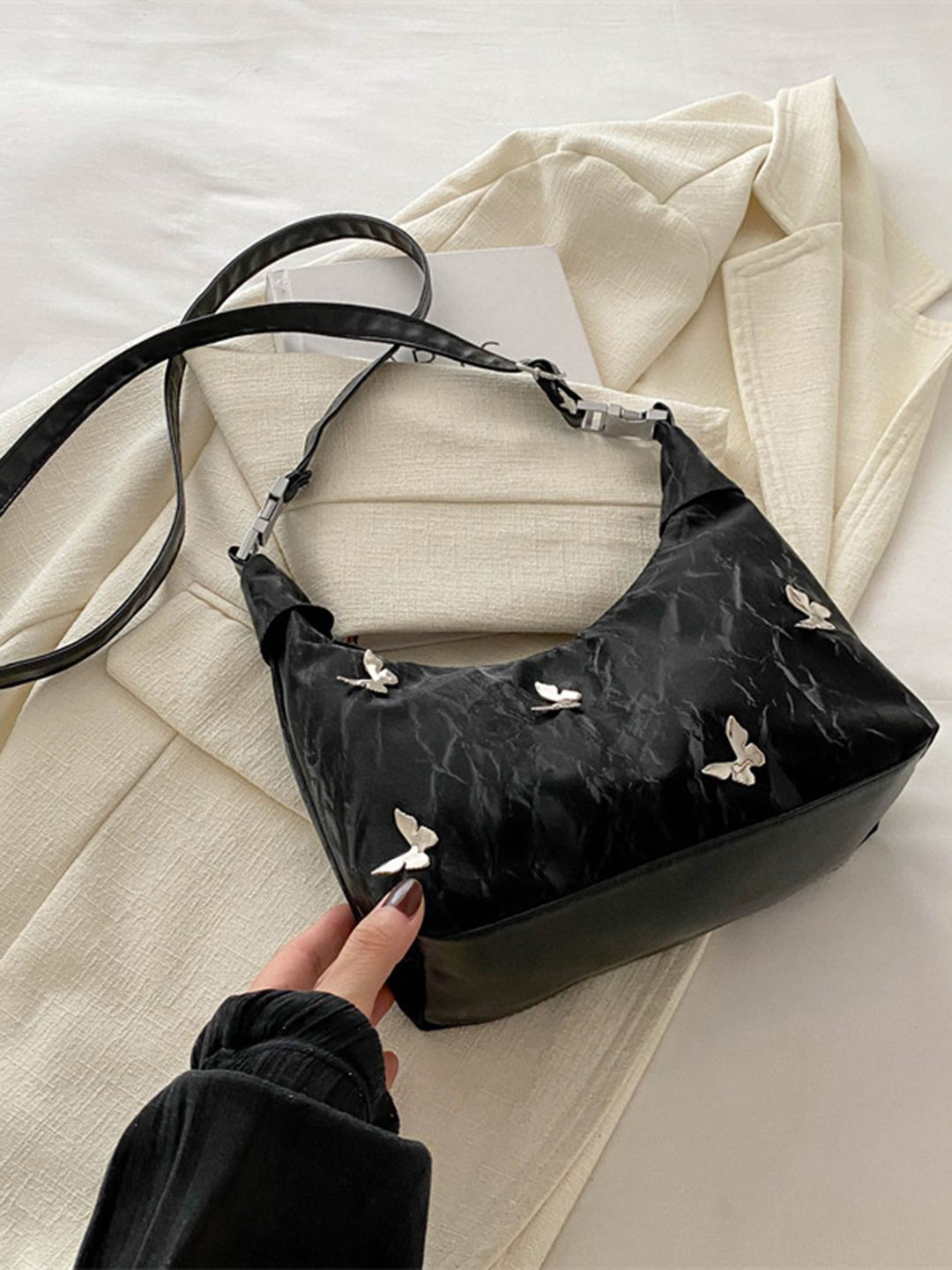 CORSICA Structured Handheld Bag with Tasselled