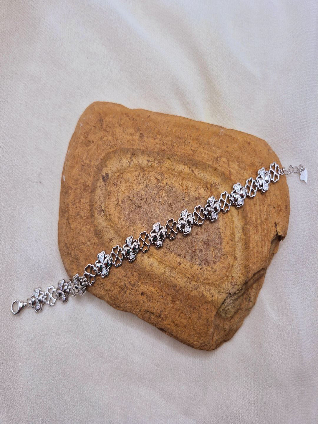 Kinavah Silver-Plated Artificial Stones Studded Wraparound Silver Bracelet