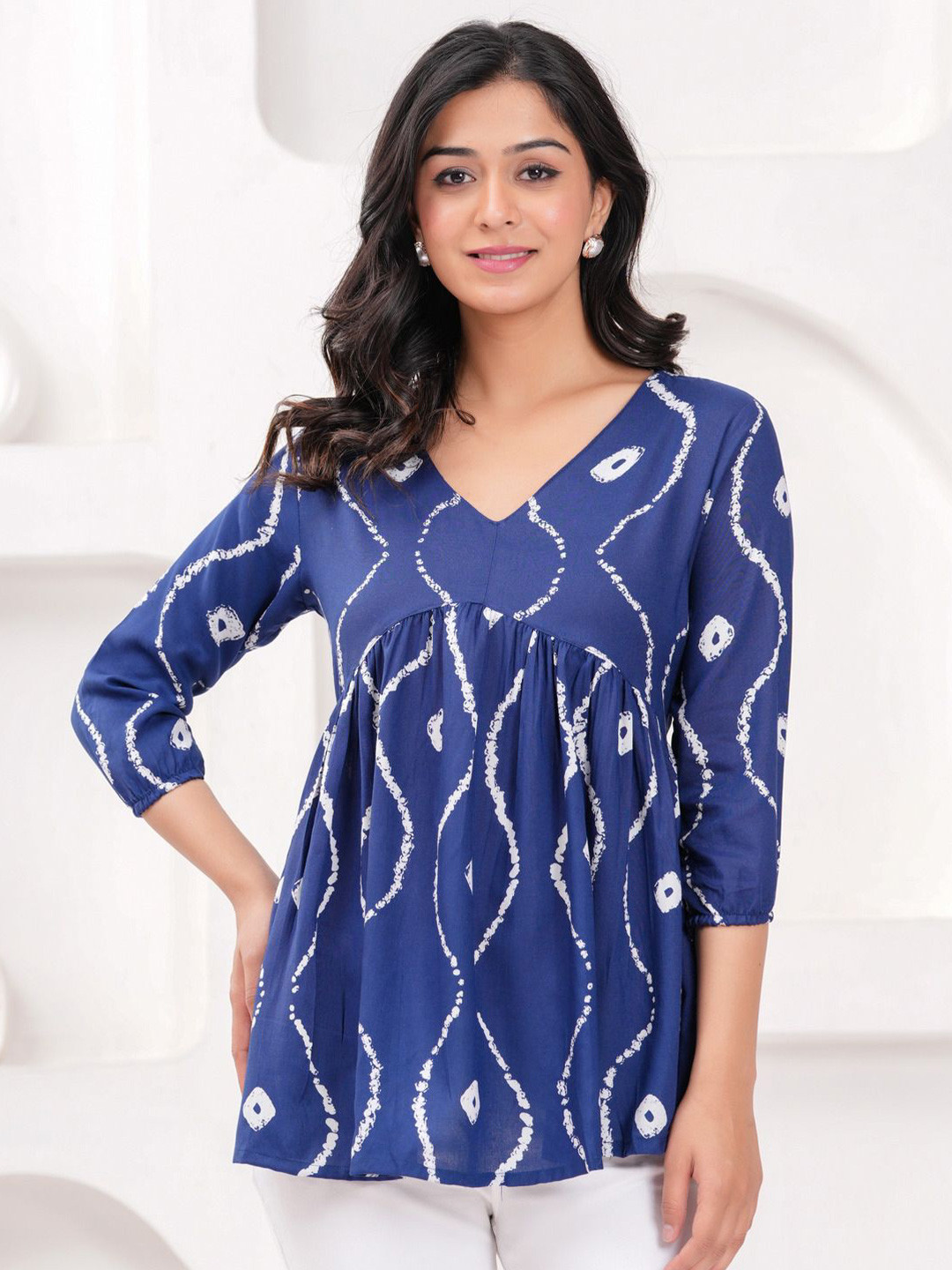Sarai Women Printed V-Neck Empire Top