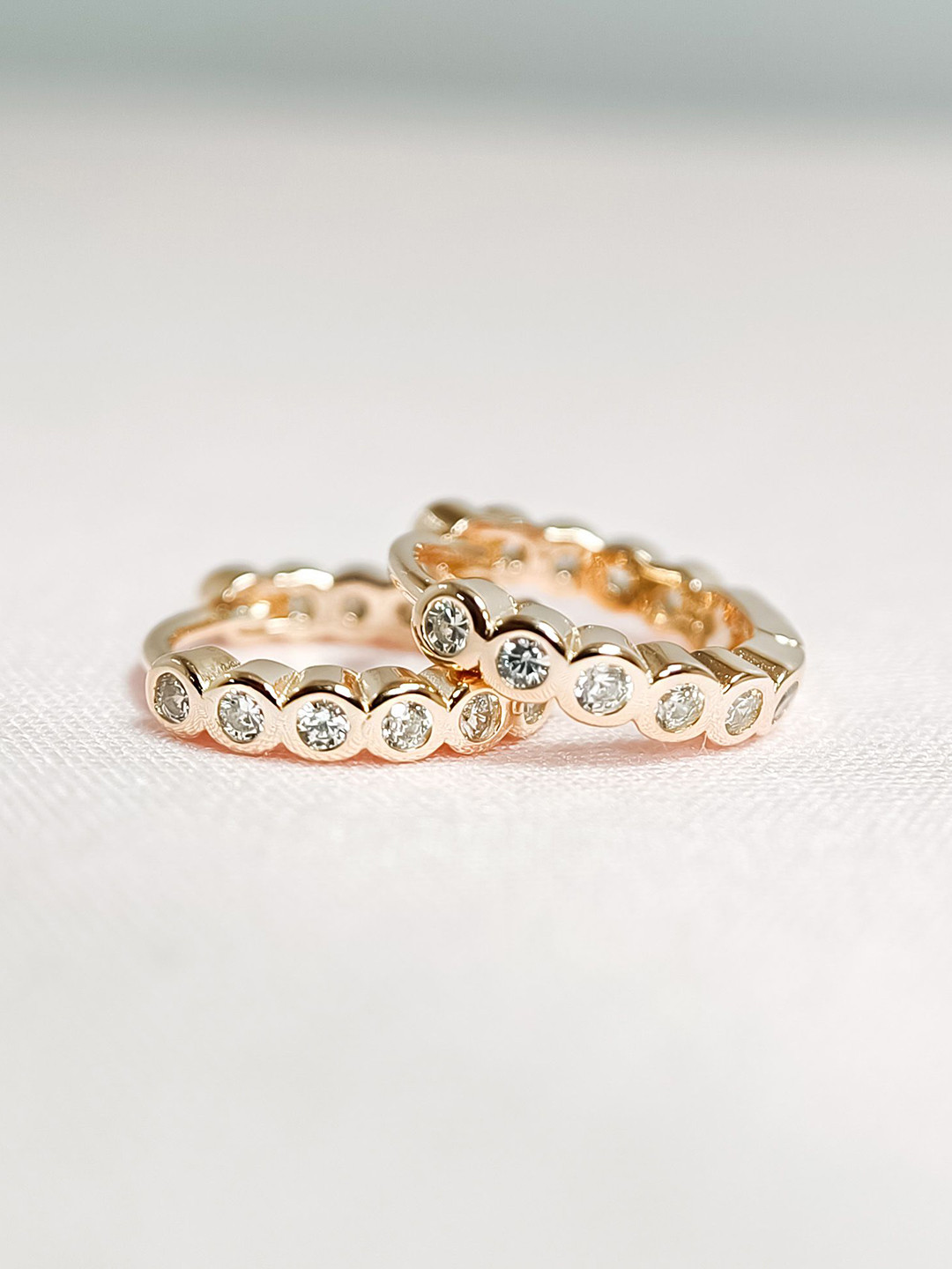 INARI SHINES 925 Sterling Silver Rose Gold-Plated CZ Studded Circular Shaped Hoop Earrings