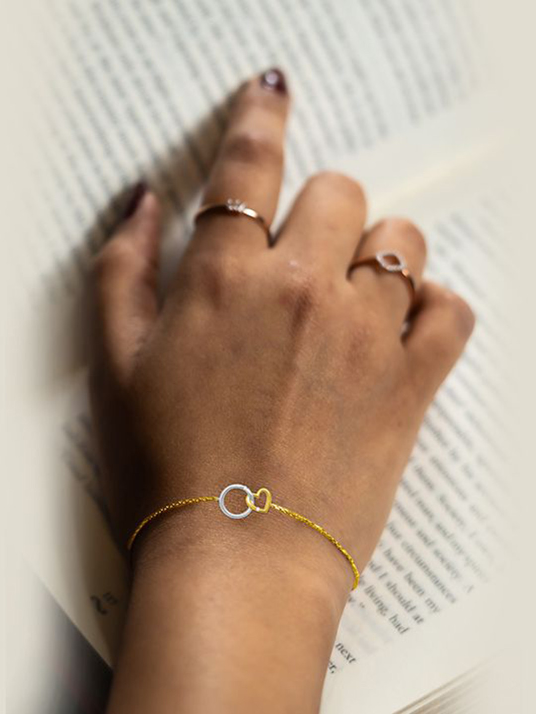 MIVRAA Women 9KT Yellow Gold Linked Love Diamond Bracelet
