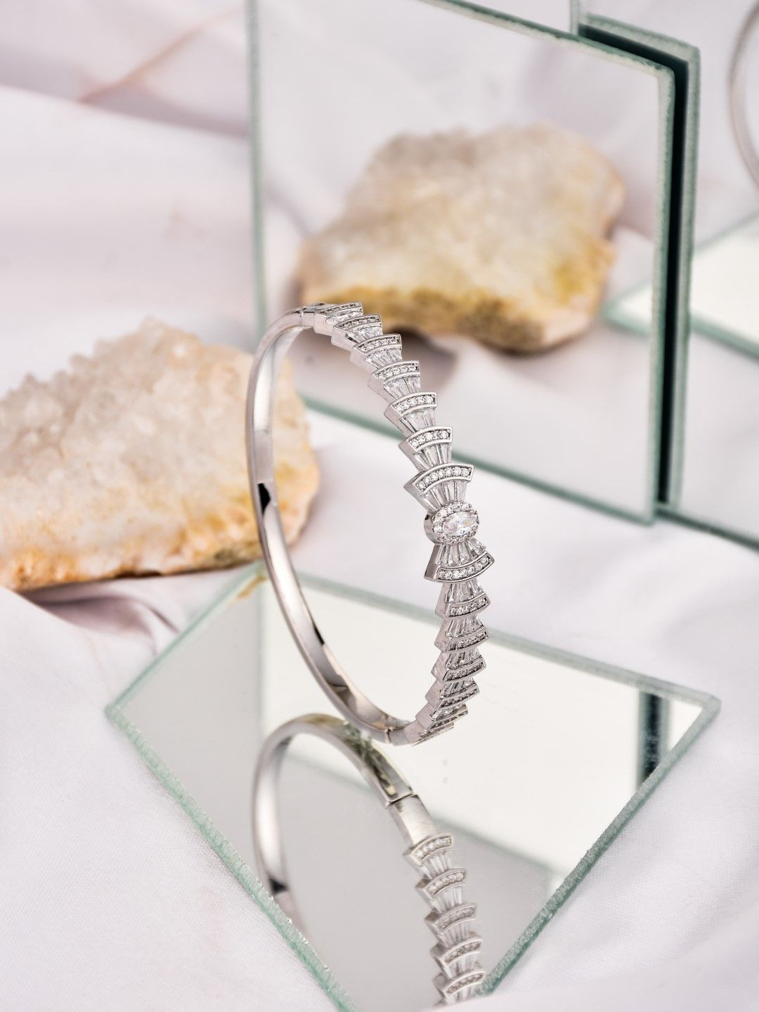 Reenisaa Rhodium-Plated American Diamond Studded Bow Shaped Openable Bangle-Style Bracelet
