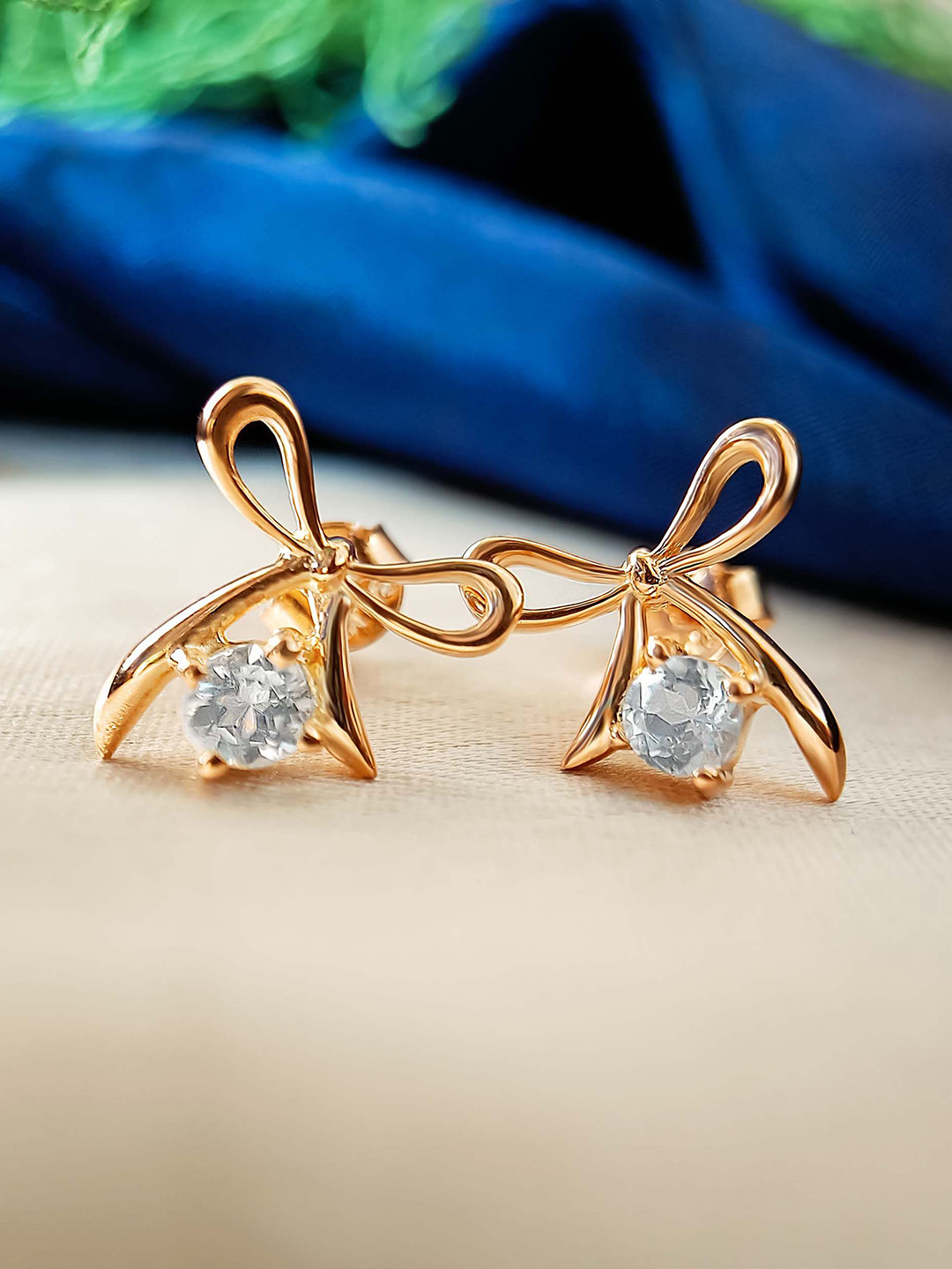 INARI SHINES 925 Sterling Silver Rose Gold-Plated Stones Studded Bow Knot Shaped Studs
