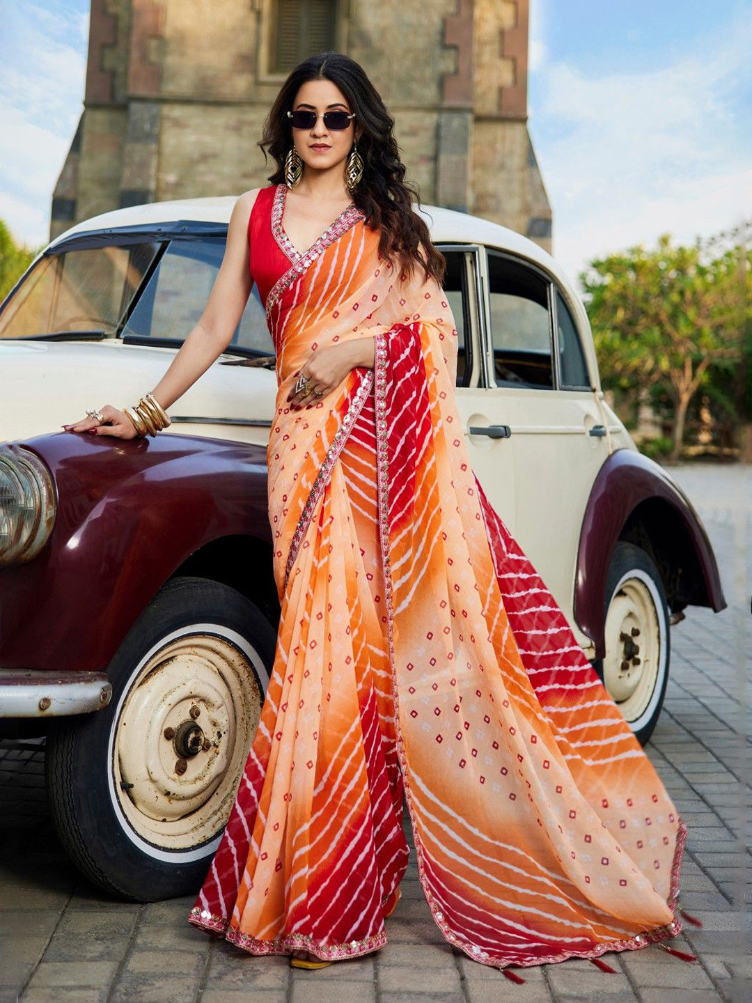 Kalista Bandhani Embellished Georgette Saree With Unstitched Blouse Piece