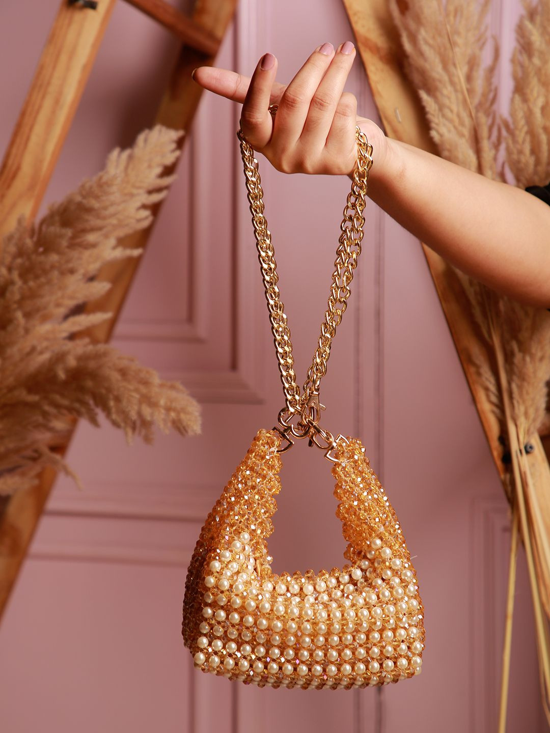 Chiaro Women Multistyle Cresent Embellished Potli Clutch bag