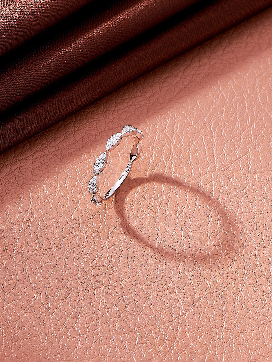 Nipura 925 Sterling Silver Rhodium-Plated CZ Studded Radiance Loop Finger Ring