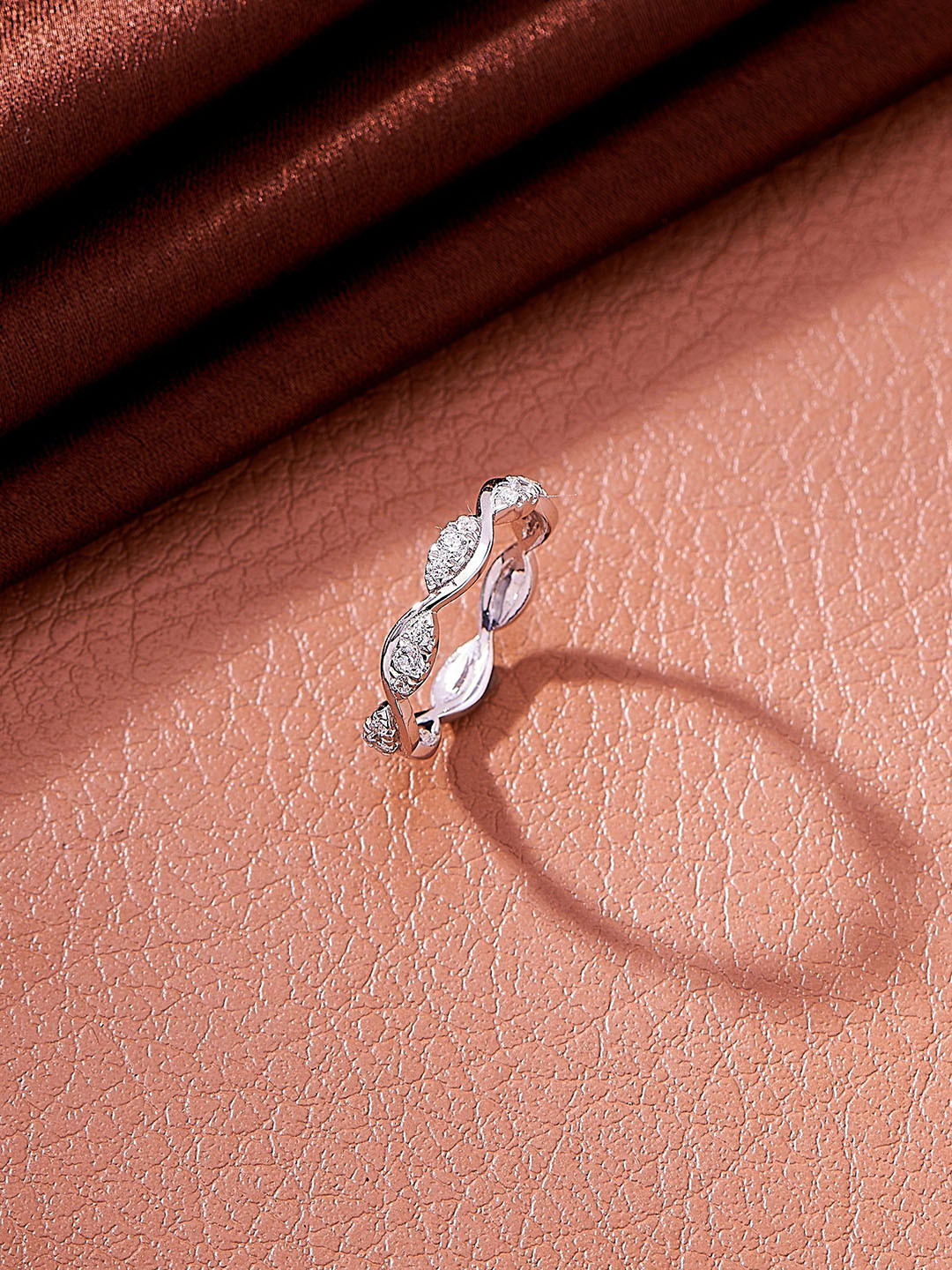 Nipura 925 Sterling Silver Rhodium-Plated CZ Studded Twisted Wave Finger Ring