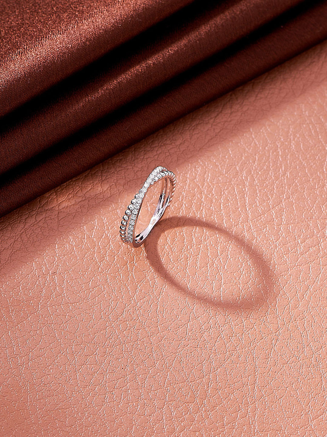 Nipura 925 Sterling Silver Rhodium-Plated CZ Studded Twist Wrap Finger Ring