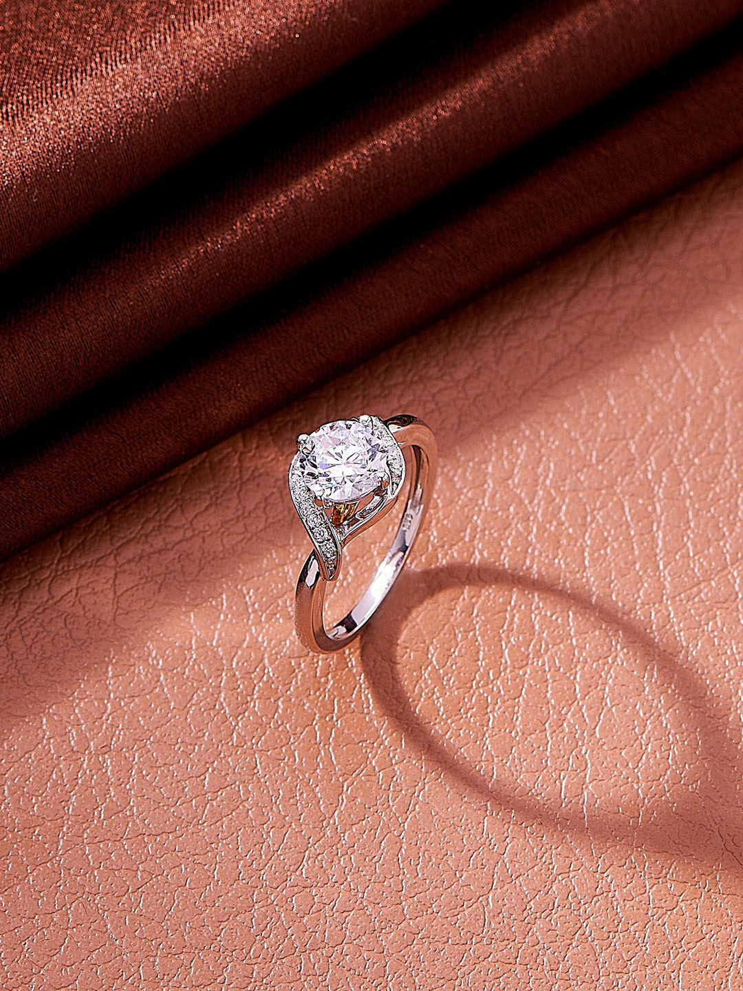 Nipura 925 Sterling Silver Rhodium-Plated CZ Studded Elegance Twist Solitaire Finger Ring