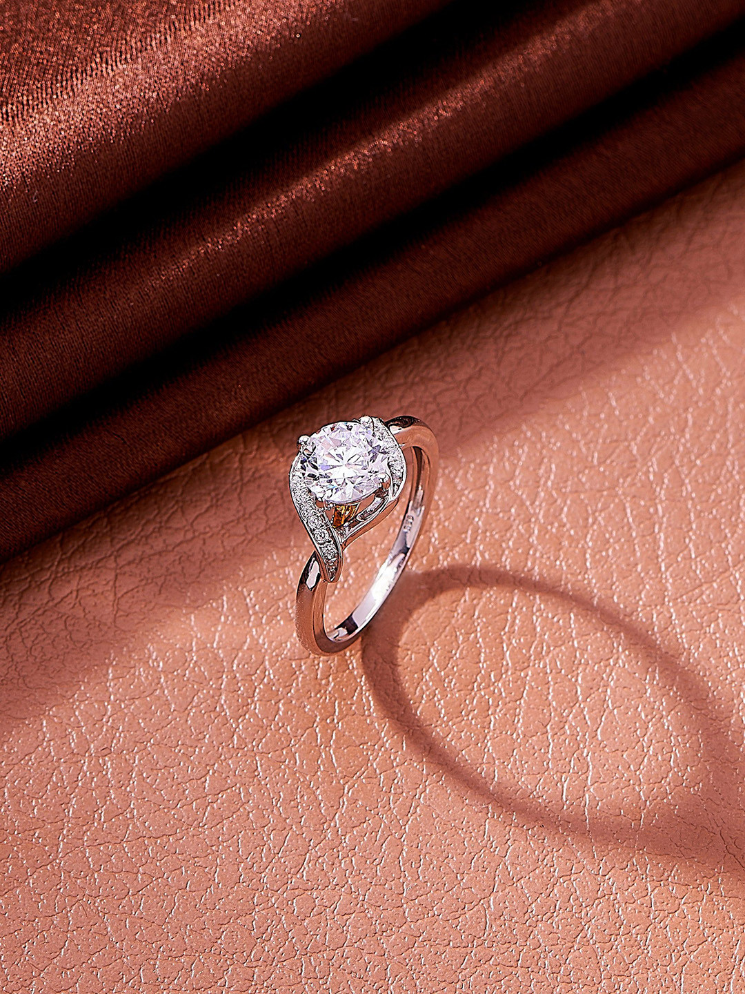 Nipura 925 Sterling Silver Rhodium-Plated CZ Studded Elegance Twist Solitaire Finger Ring