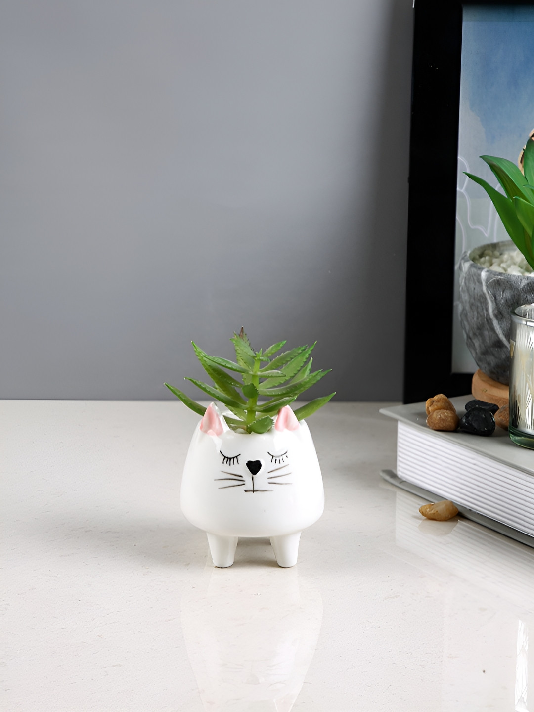 Myntra Elegant Homes White & Green Whisker Cat Ceramic Artificial Flowers and Plants