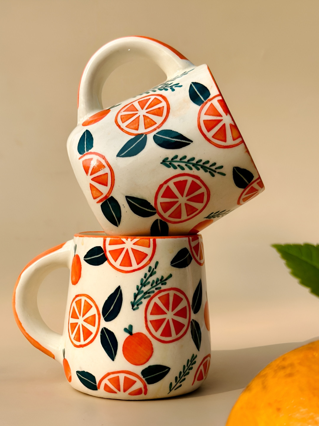NURTURE INDIA Orange & Cream-Coloured Printed Ceramic Glossy Mug 250ml