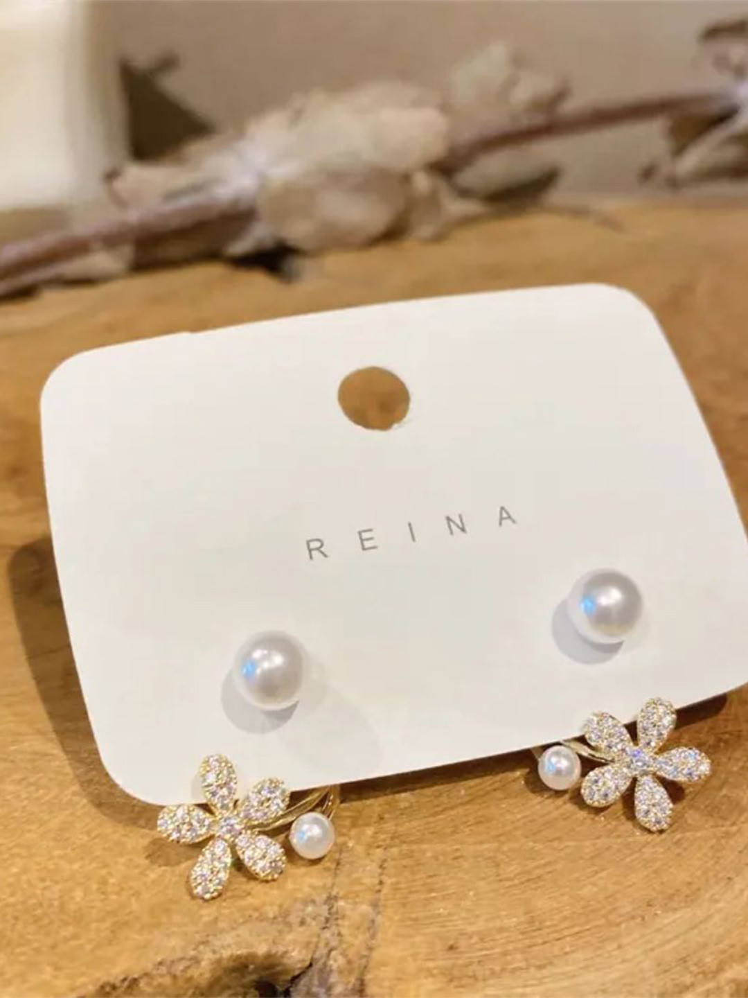 Estailo fashion Cubic Zirconia Studded Floral Studs