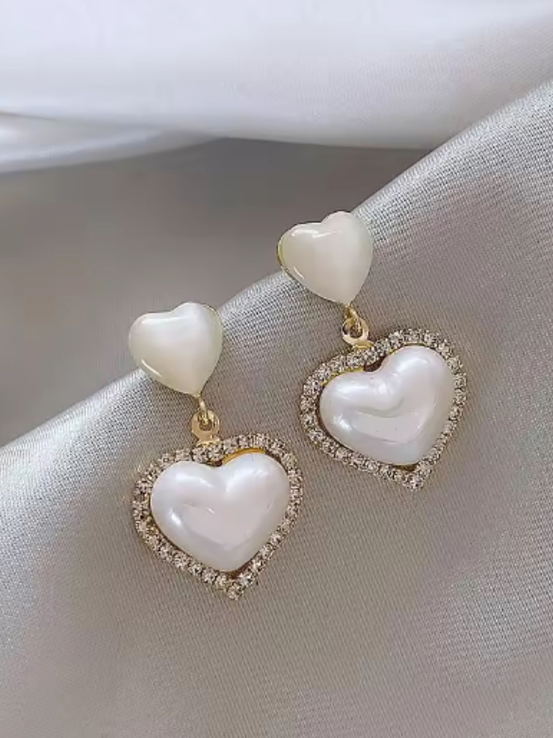 SUBHAGALANKAR Gold-Plated Artificial Stones Studded Double Heart Shaped Drop Earrings
