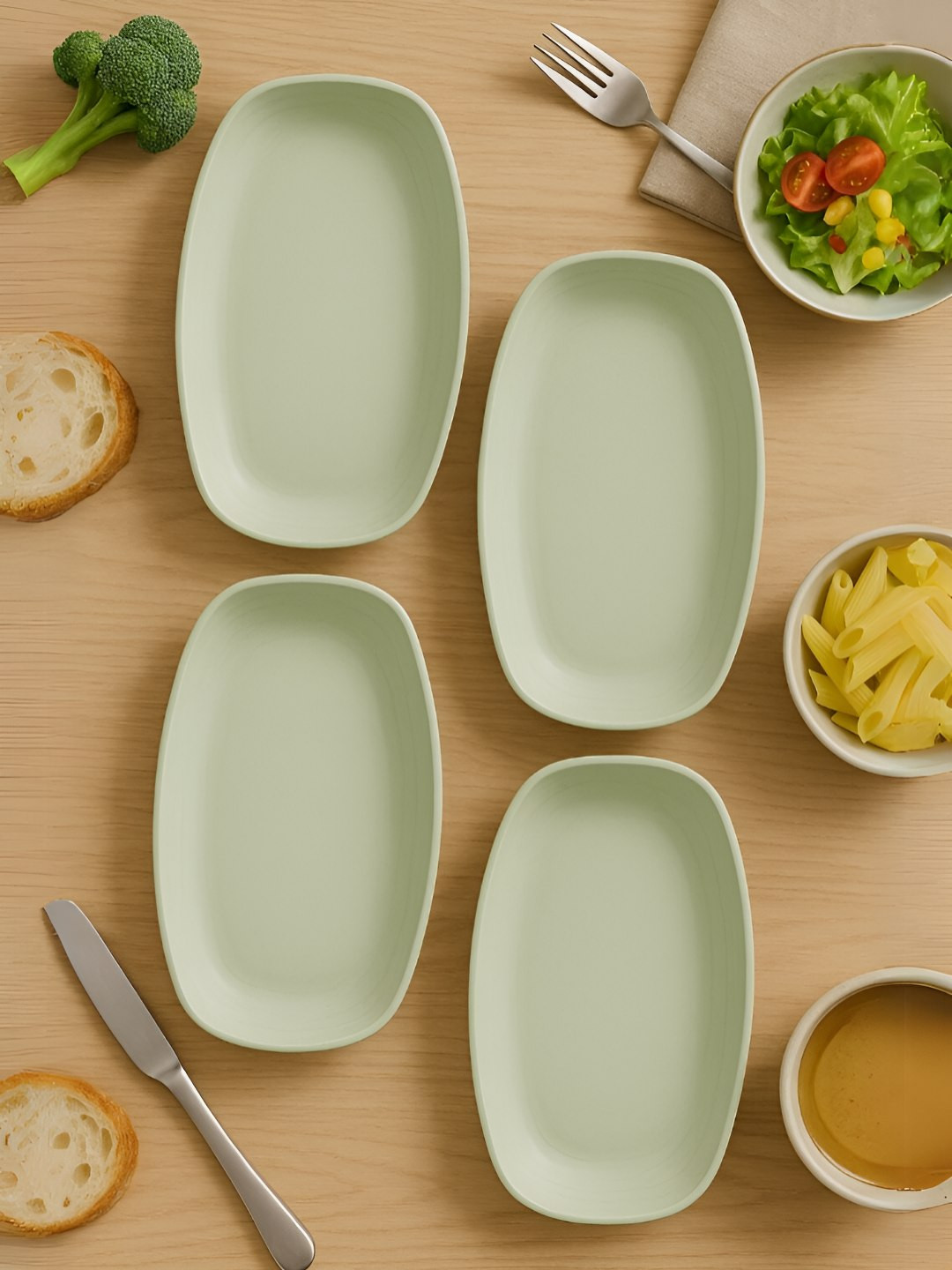 Myntra Elegant Homes Green 4 Pieces Bamboo Dishwasher & Microwave Safe Oval Shaped Plates