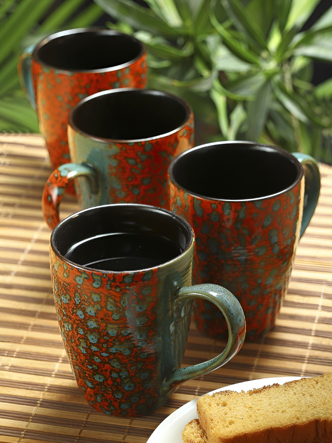 Myntra Elegant Homes WOODENWARES Red Abstract Ceramic Handmade 4 Piece Mugs-250ml