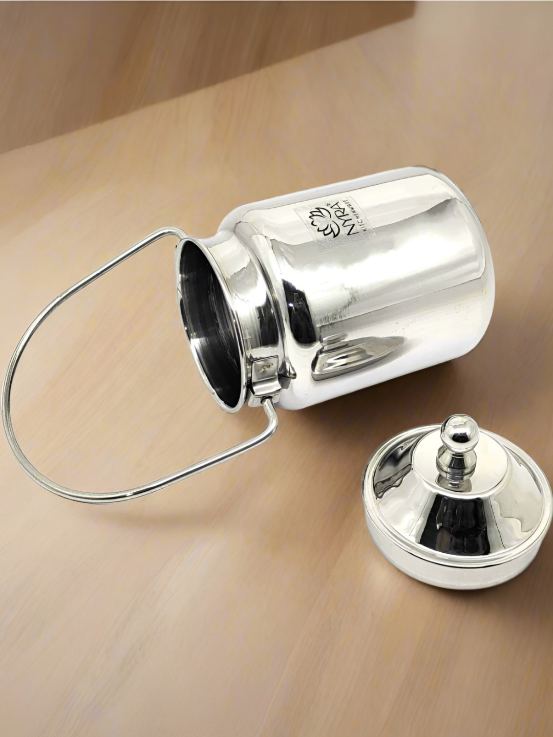 Nyra Kitchenware Steel Stainless Steel Durable Flip Top Milk Pitcher-750ml