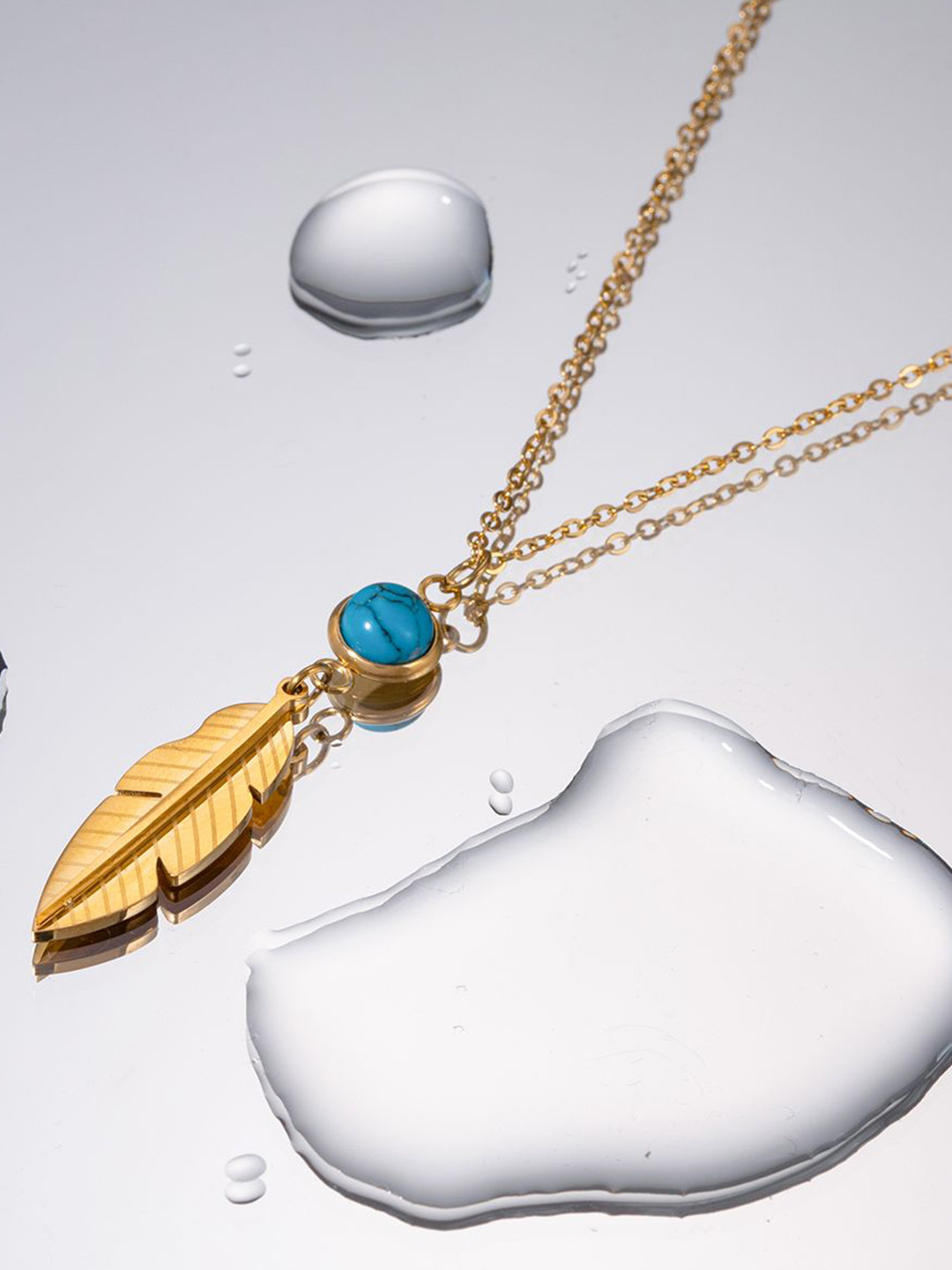 Aiza 18KT Gold Plated Aqua Feather Pendant with chain