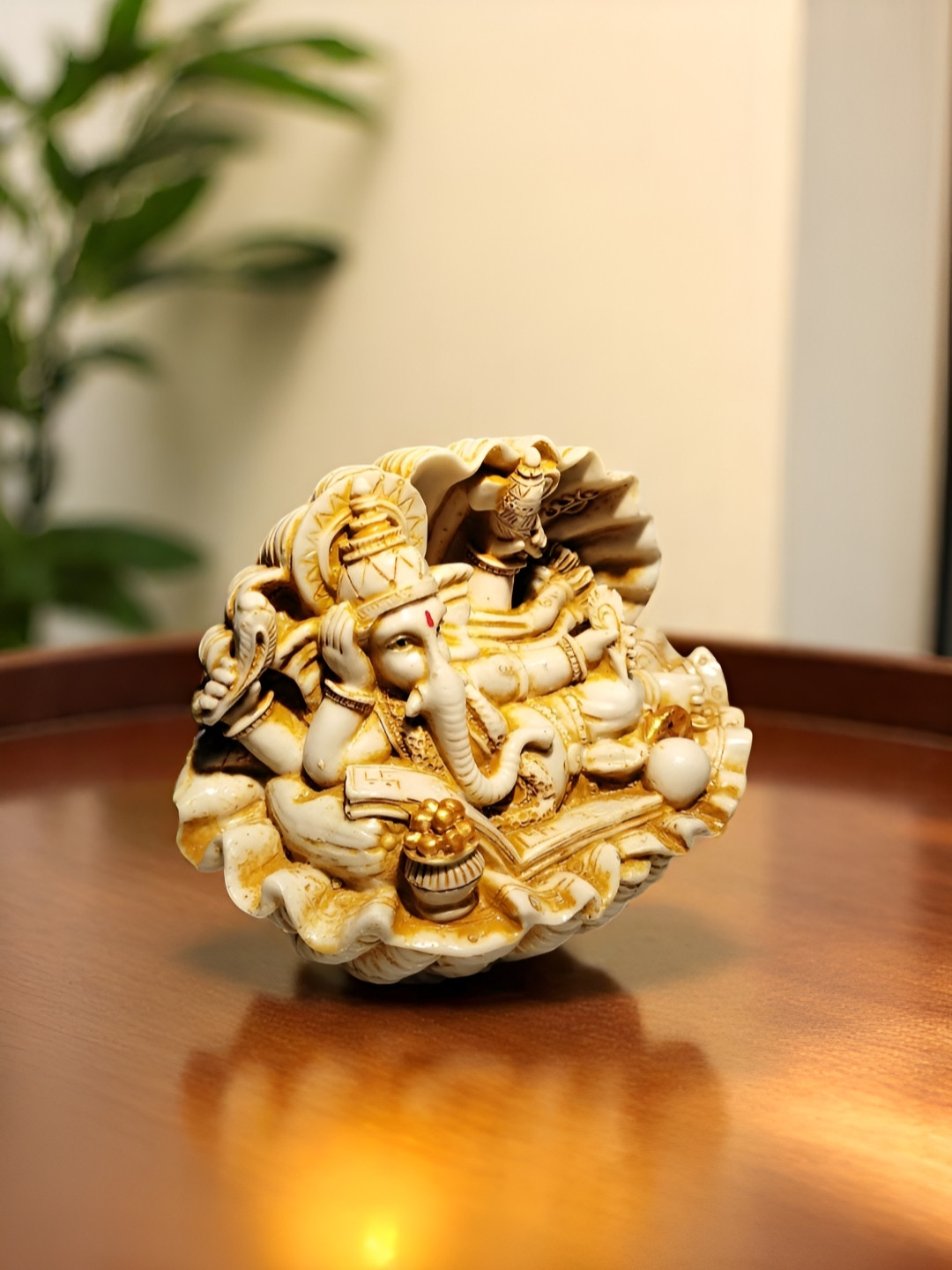 GLOBAL AROMA Ganesha Yellow Polyresin Glossy Prayer Room Tiny Showpiece - 3.9 Inches