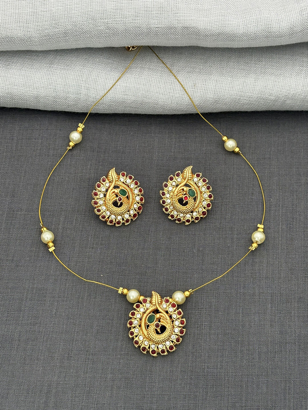 Anouk Gold Plated Pearl Work Peacock Design Necklace & Earrings Set