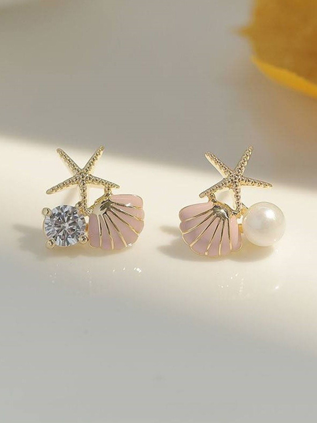 ISHKAARA Women Contemporary Pearl Shell Crystal Studs Earrings