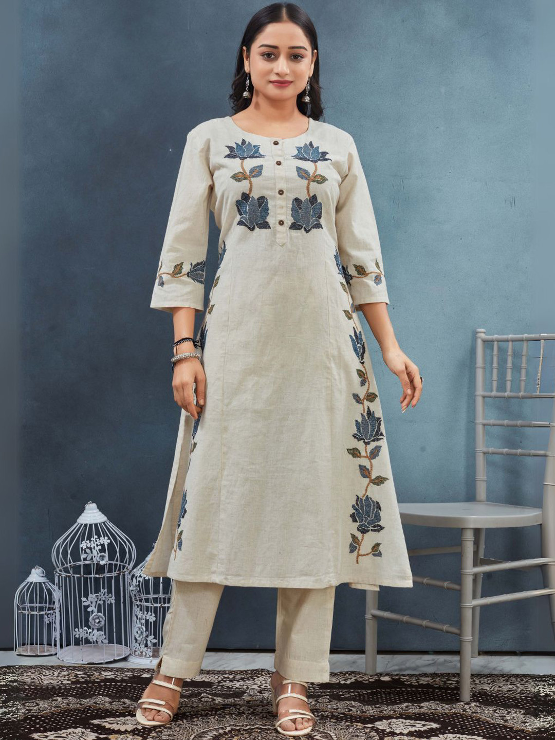 Flossy Women Solid Embroidered Regular Pure Cotton Kurti with Trousers