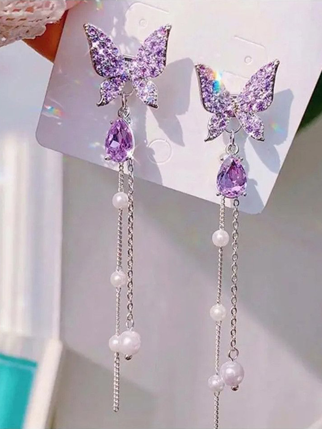 Celestique Silver-Plated Pearls Beaded Charms Studded Butterfly Shaped Drop Earrings