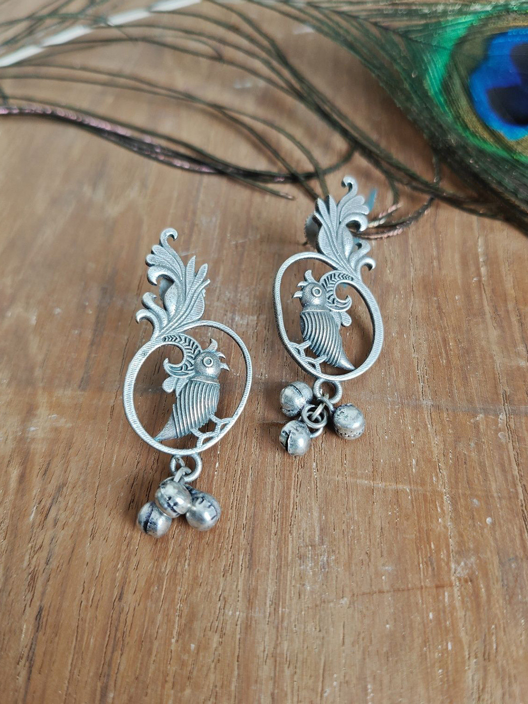 The Advitya Ghungroo Studded Bird Shaped Oxidised Drop Earring