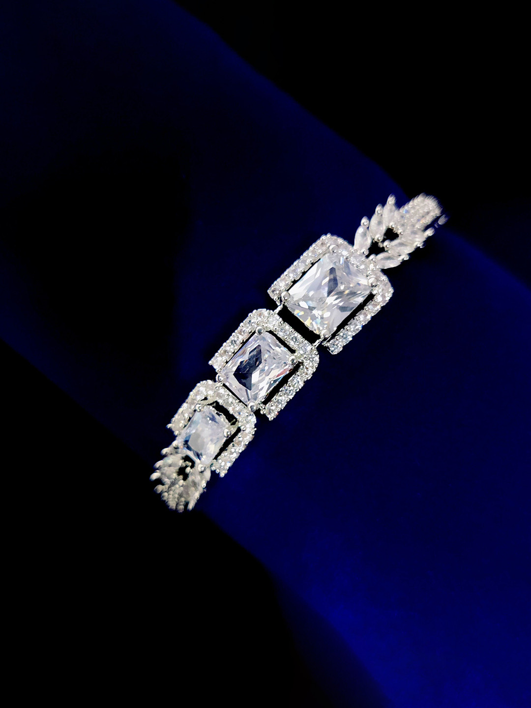 Opal Touch Luminous Rhodium-Plated Cubic Zirconia Studded Bangle-Style Bracelet