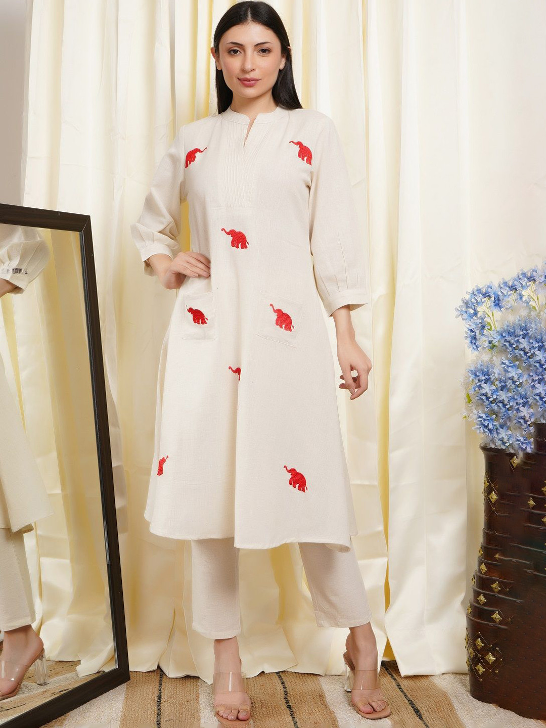 ALLEN WEAVE Women Animal Embroidered Kurta with Trousers