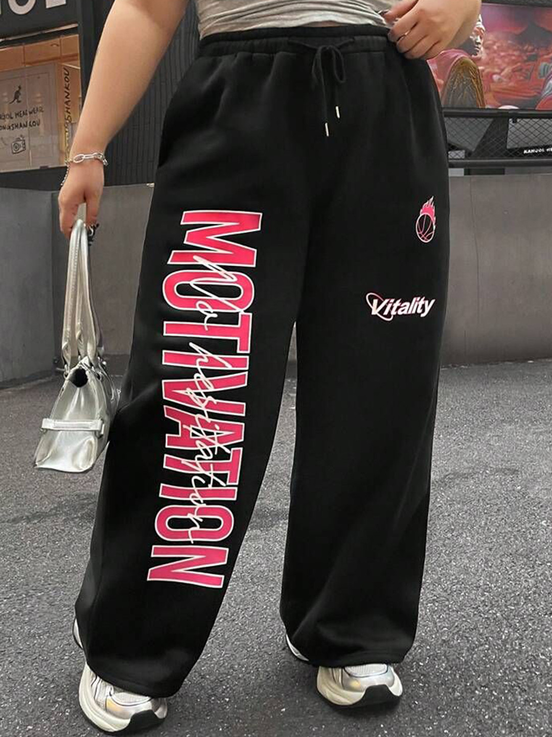 TABADTOD Women Typography Printed Relaxed Loose Fit Mid-Rise Flat-Front Parachute Trousers