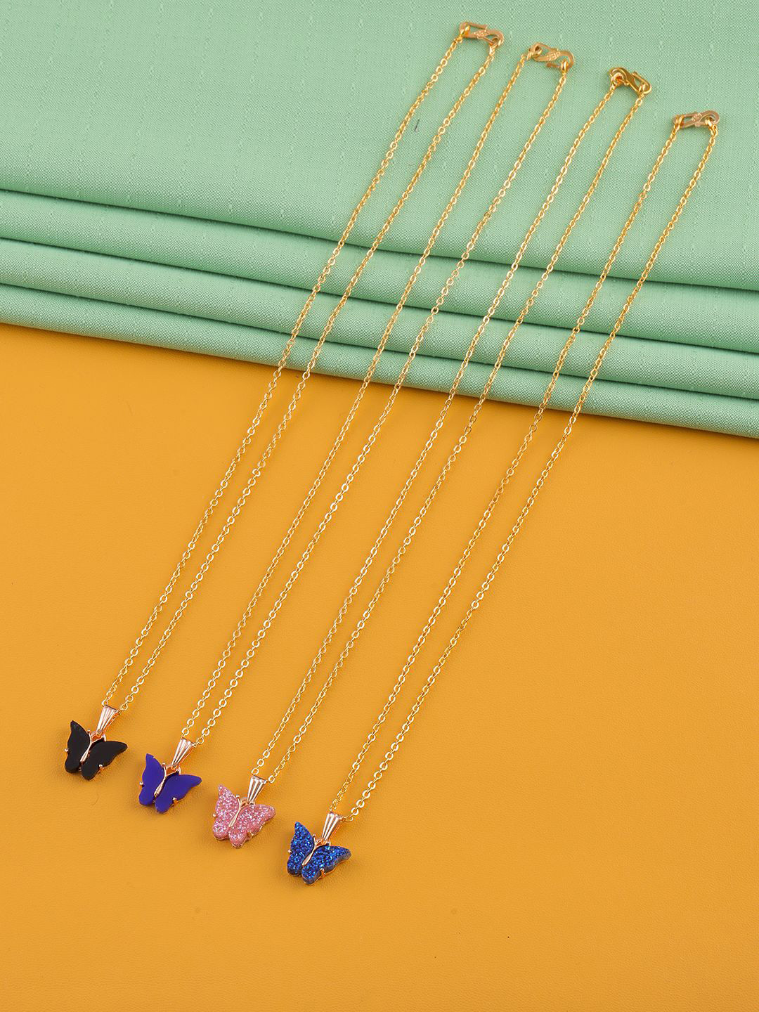 DressBerry Set Of 4 Gold-Plated Sparkling Resin Butterfly Pendant With Chain