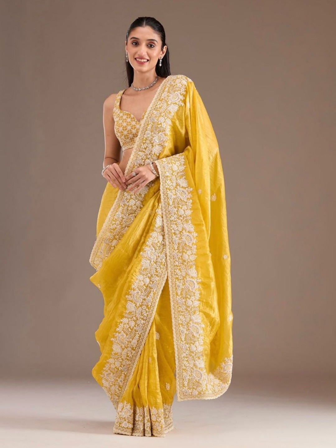 ODETTE Women Yellow Crush Embellished Ethnic Motifs Embroidered Saree