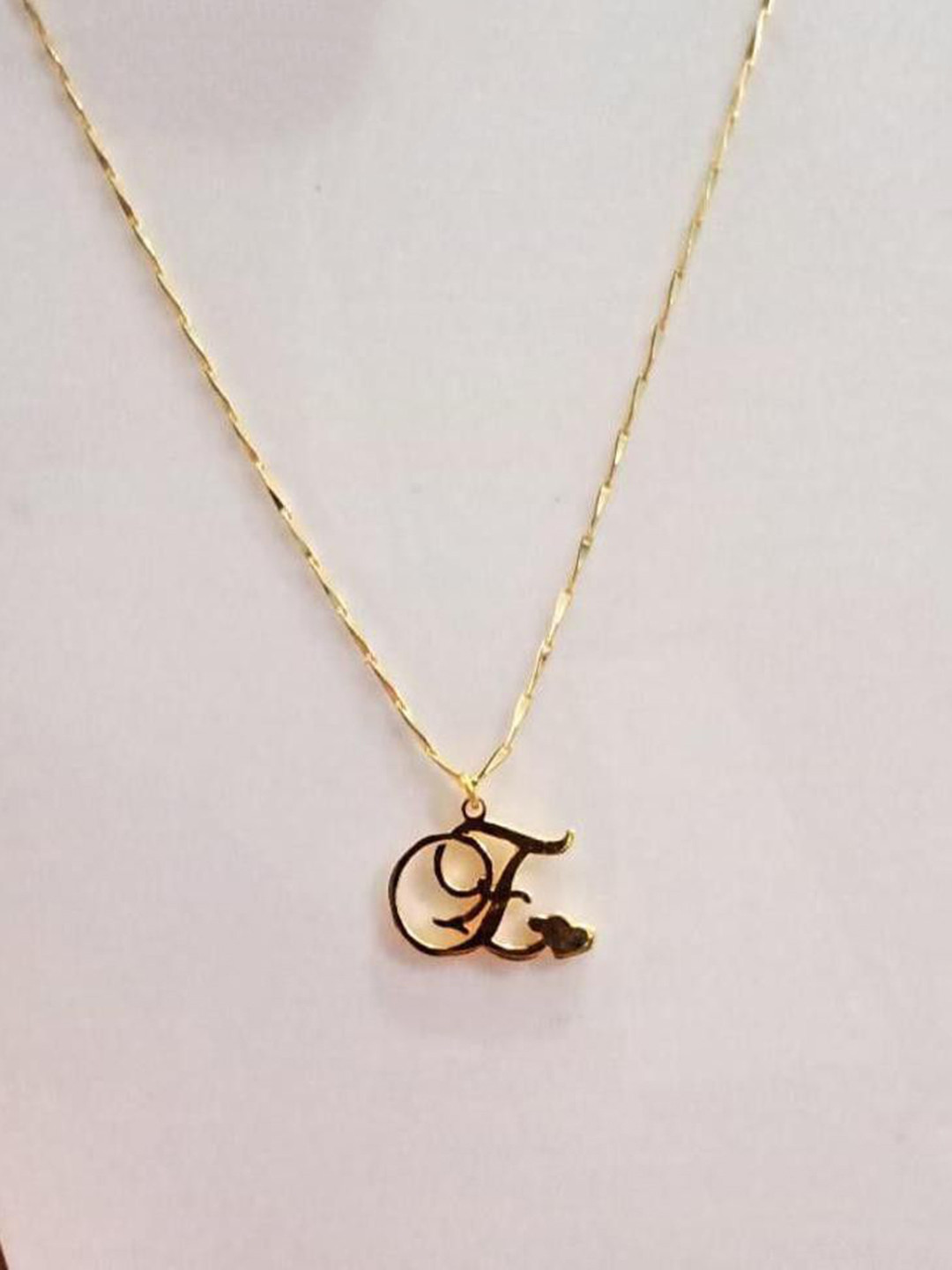 SR Export Gold-Pated Pendant