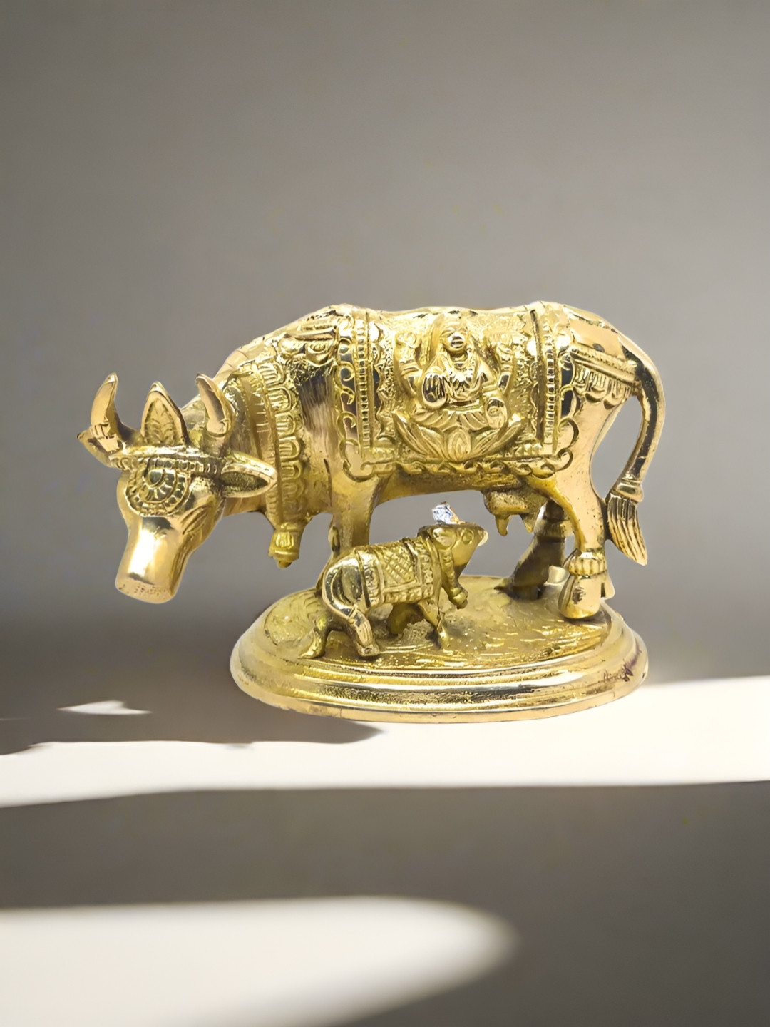 Nyra Kitchenware Kamdhenu Cow and Calf Bronze Metal Metallic Prayer Room Hand-Crafted Set of 2 Tiny Showpieces - 2.8 Inches