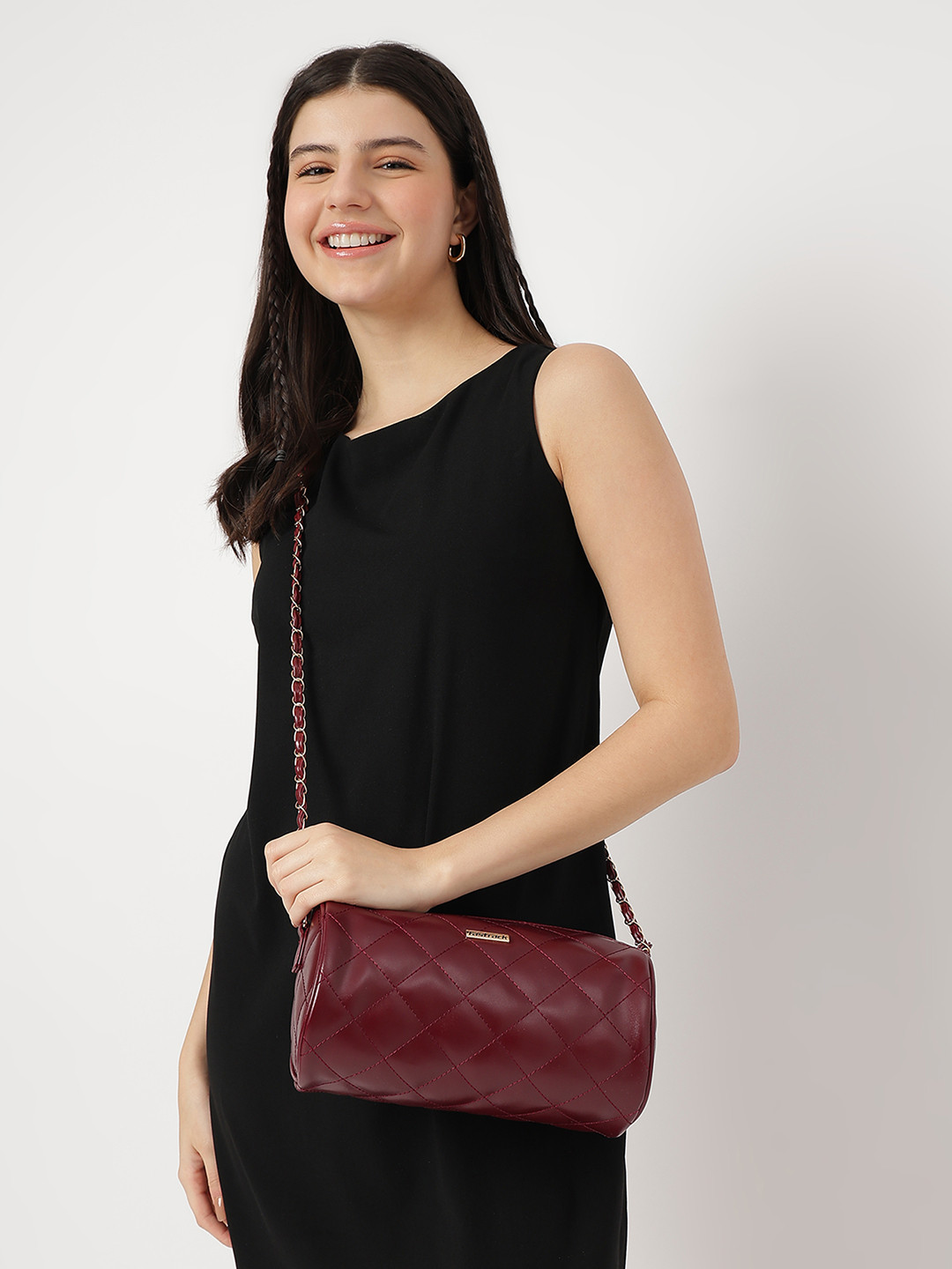 Fastrack Women Solid Quilted Bowling Cylinder Sling Bag