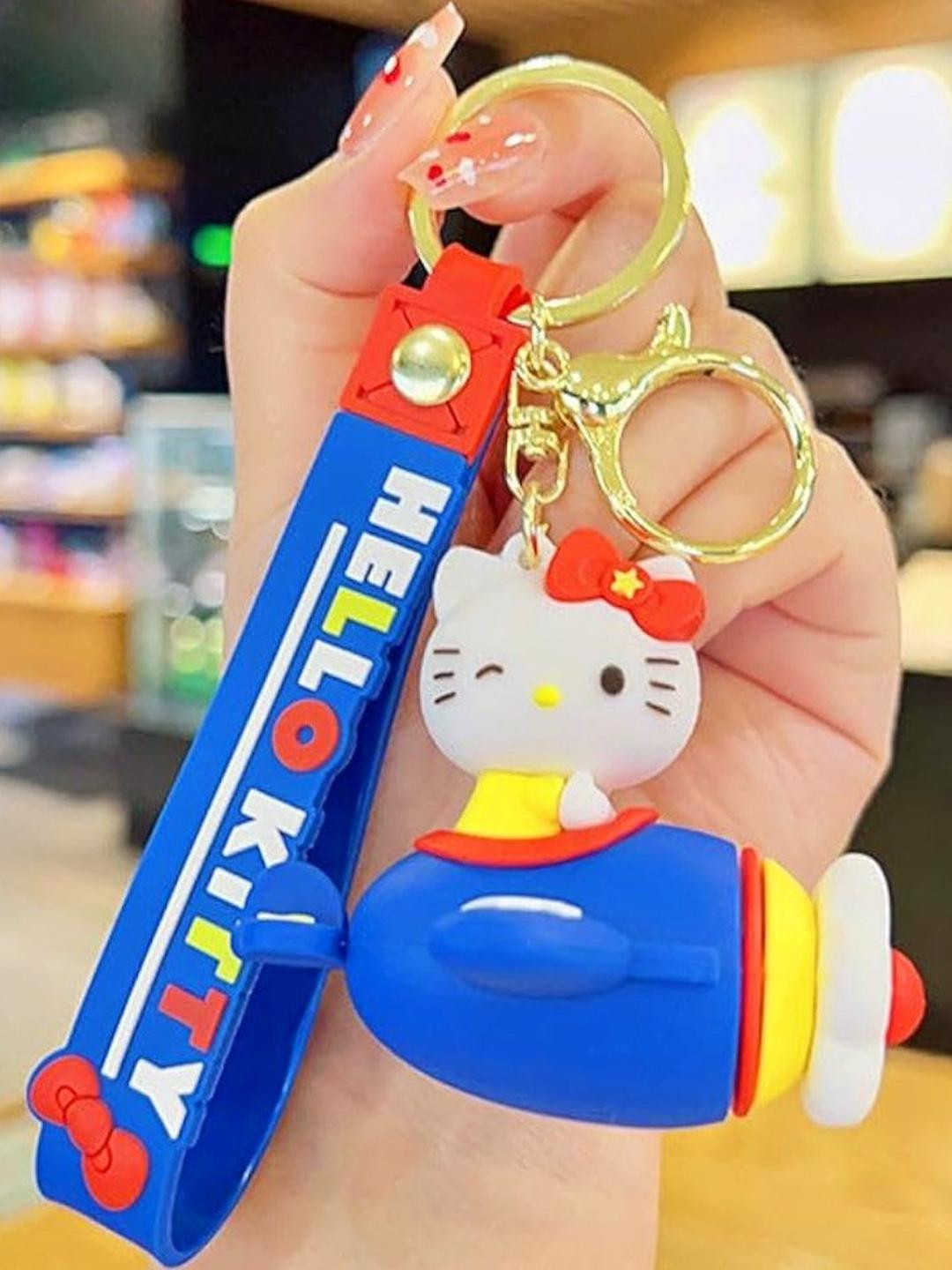 ANTIQ CREATION Blue & Red Hello Kitty On Air Plane Key Chain.