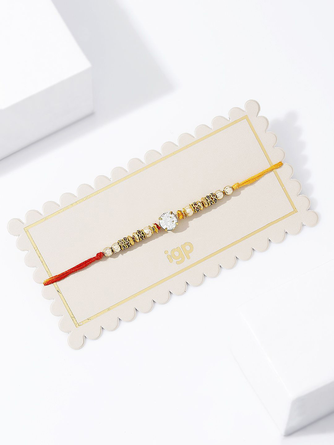 IGP Thread Stones Studded And Beaded Rakhi